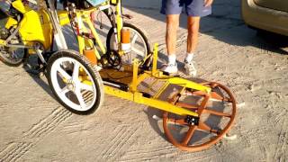 Clever custom built metal detector beach bicycle