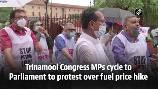 Trinamool Congress MPs cycle to Parliament to protest over fuel price hike