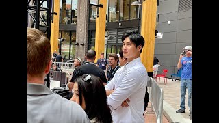 Shohei Ohtani being interviewed by the press before the Home Run Derby on Media Day.