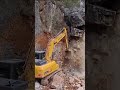 excavator with damaged cylinder after being hit by a falling rock