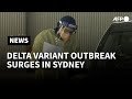 Australia records over 1,000 coronavirus cases for the first time | AFP