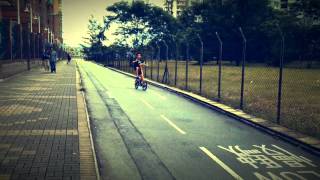 My 11-year-old boy riding a Strida LT Folding Bicycle in Hong Kong