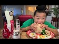 chinese girl eating spicy papaya salad with cow offal