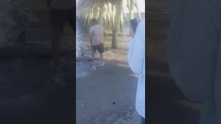 Beachgoers Help a Beached Shark in Myrtle Beach, South Carolina