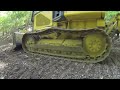 john deere 550j dozer reclearing an old road