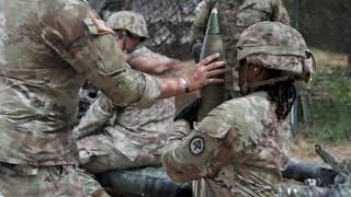 Soldiers of the 112th Field Artillery Regiment shoot 105mm Howitzers at XCTC