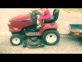 sophia on the lawn mower