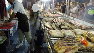 Italy Street Food Festival in Milano. Grilled Meat, Roasted Pork, Sausages, Burrata, Fried Pizza