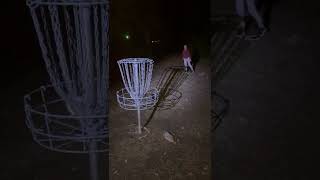 Calvin putting. Glow Disc Golf at Miller Farm Park, Willard MO.