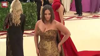 Video  Ashley Graham rocks a golden gown with a high cut slit