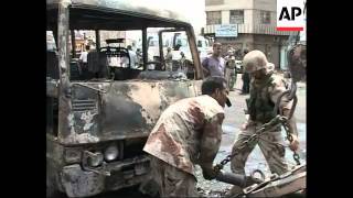 Aftermath of minibus explosion in Baghdad that killed at least six people