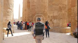 STOCK FOOTAGE - Group of Tourists Gathered in the Open-Air Museum