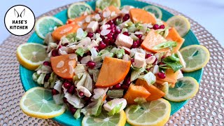 Winter salad with persimmon, pomegranate and feta