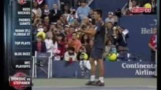Novak Djokovic and John McEnroe play tennis at the U.S. Open - Sept 7, 2009