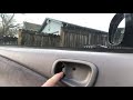 Replace inside door handle for Toyota Corolla 1998 - 2002.  Closeup detail.