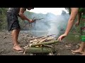 primitive life technology wild fishing primitive skills cooking big fish eating delicious