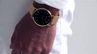 Gold and black watch