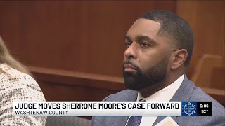 Judge approves Ex-Michigan coach Moore's request for evidentiary hearing
