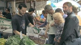Greek price drop offers help to households - economy