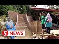 Floods: Houses in Hulu Langat flattened, family's heritage home left with just staircase