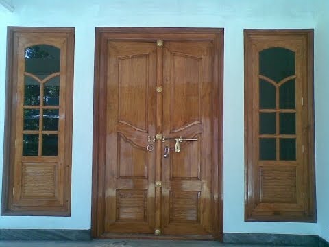 Kerala Model Double Door Wooden design Kerala Model Double Door Wooden design