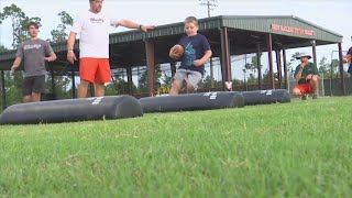 Mosley hosts youth football camp