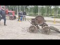 mighty valmet 23 tractor and old stone crusher machine