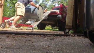 Unloading Diesel Barrels from Truck