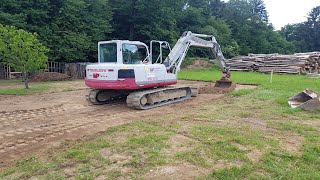 LOADING TOPSOIL WITH TAKEUCHI TB175