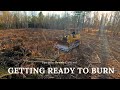 Building a massive brush pile to burn