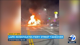 Jeep set on fire during chaotic street takeover in Los Angeles