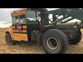 converted school bus now high speed hay bale loader