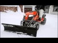 Husqvarna tractor with snow blade