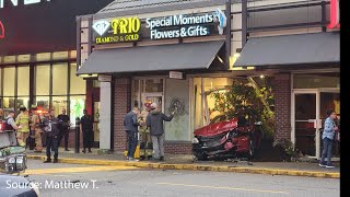Video shows car slamming into North Vancouver shop