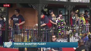 Louisiana Office of Tourism rides in giant French Quarter float