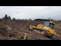 cat d6k2 pushing topsoil