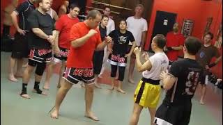 scoop block Muay Thai defense