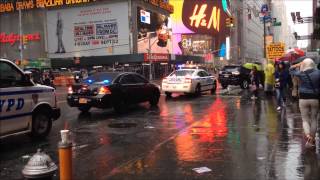 RARE CATCH OF 2 NYPD HERCULES TEAMS CROSSING PATHS AS THEY PATROL ON W. 42ND ST. IN TIMES SQUARE.