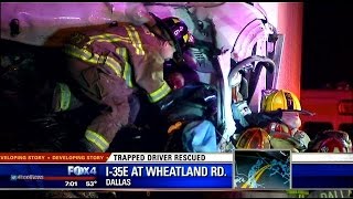 Driver rescued after 18-wheeler crash