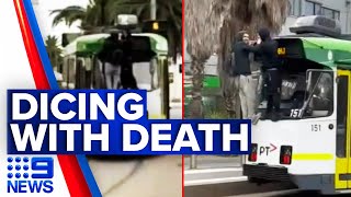 Reckless thrill seekers risk their lives tram surfing in Melbourne | 9 News Australia