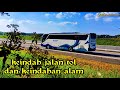 nyambangi jalan tol dan melihat alam indah sektar.