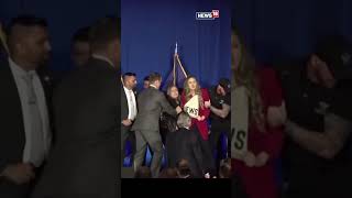 Shorts | MOMENT: Two Protesters Rush Stage During DeSantis Speech In New Hampshire | DeSantis Speech