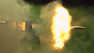 Firing a .50 Cal Sniper Rifle in Slow Motion - The Slow Mo Guys