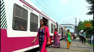 Beautiful purple colour ICF MEDHA EMU train arriving balagarh railway station in a sunny day