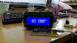 Fancy LCD Clock and Thermometer using PIC microcontroller