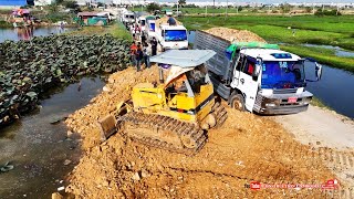 Full Process Landfill Operation Small Komatsu Dozer Pushing Soil Stones And Mini Dump Truck Teamwork