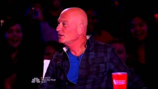 Hypnotist Tricks Howie Mandel into Shaking Hands