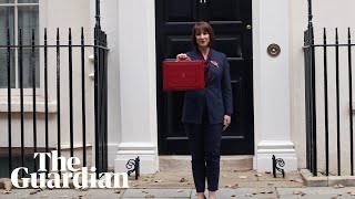 Rachel Reeves holds up red box at Downing Street before budget