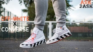 off white converse on feet