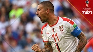 WHAT. A. GOAL...Kolarov scores on booming free-kick to give Serbia 1-0 lead